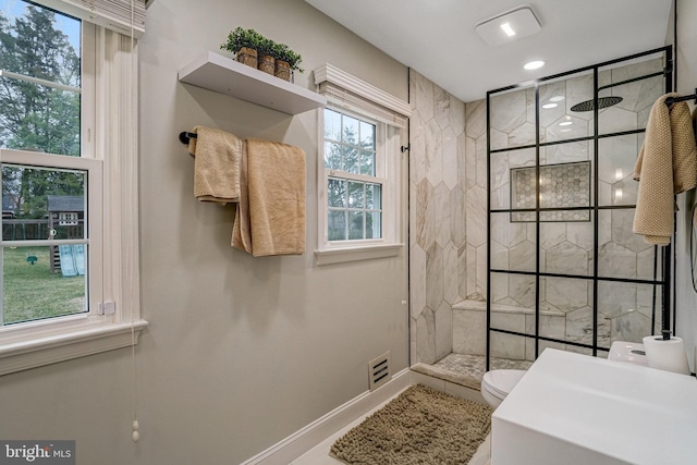 full bathroom with visible vents, baseboards, toilet, walk in shower, and recessed lighting