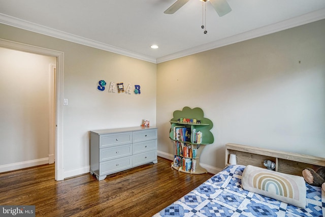 bedroom with a ceiling fan, baseboards, ornamental molding, and wood finished floors