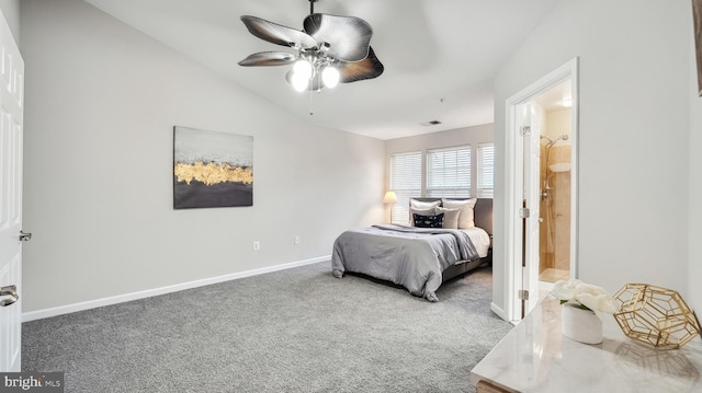 bedroom featuring lofted ceiling, visible vents, a ceiling fan, carpet flooring, and baseboards