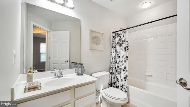 full bath featuring shower / bathtub combination with curtain, vanity, and toilet