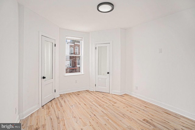 5126 N Sydenham St, Philadelphia, PA 19141 - empty room featuring light wood finished floors and baseboards