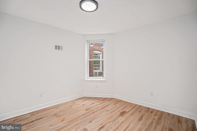 5126 N Sydenham St, Philadelphia, PA 19141 - unfurnished room with wood finished floors, baseboards, and visible vents