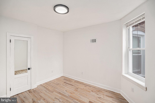 5126 N Sydenham St, Philadelphia, PA 19141 - empty room featuring visible vents, baseboards, and wood finished floors