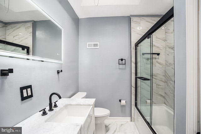 5126 N Sydenham St, Philadelphia, PA 19141 - bathroom with visible vents, combined bath / shower with glass door, toilet, vanity, and marble finish floor