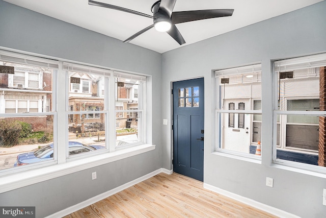 5126 N Sydenham St, Philadelphia, PA 19141 - foyer entrance featuring baseboards, light wood finished floors, and ceiling fan