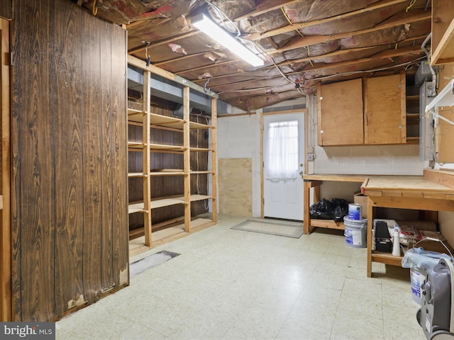 below grade area featuring tile patterned floors