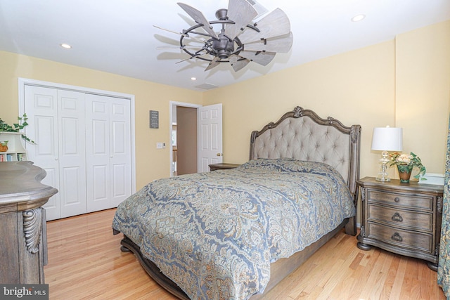 bedroom with a ceiling fan, recessed lighting, a closet, and wood finished floors