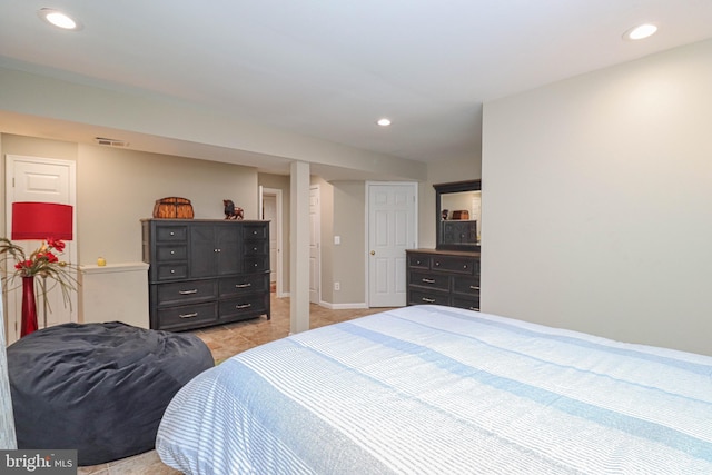 bedroom featuring baseboards, light tile patterned flooring, visible vents, and recessed lighting