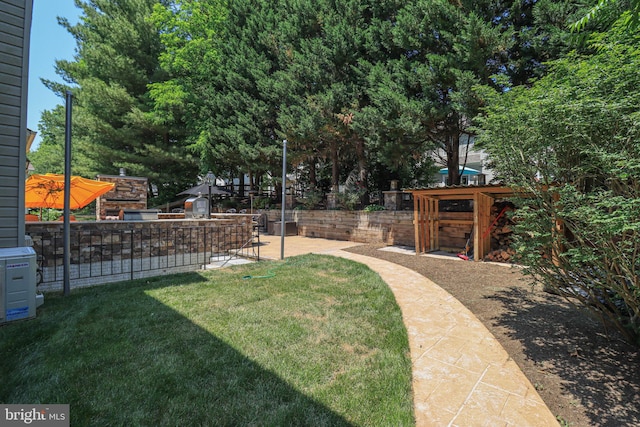 view of yard featuring a patio area and fence