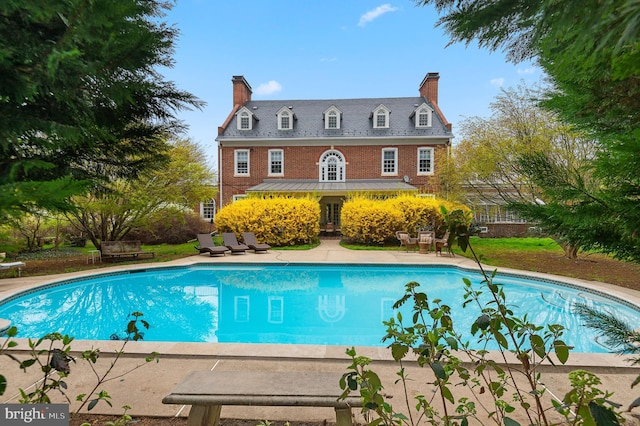 pool featuring a patio