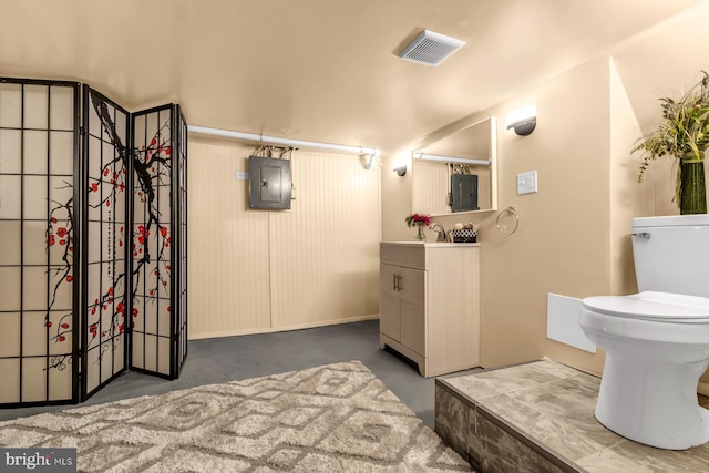 bathroom featuring concrete floors, electric panel, visible vents, and vanity