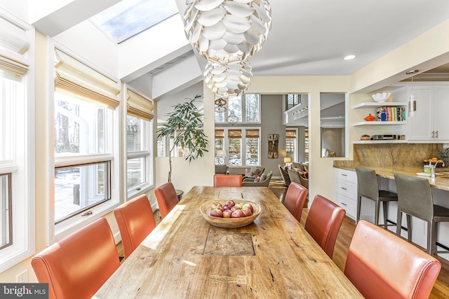 dining area featuring a skylight