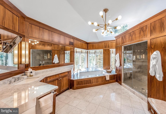 full bath featuring a stall shower, lofted ceiling, vanity, wood walls, and a bath