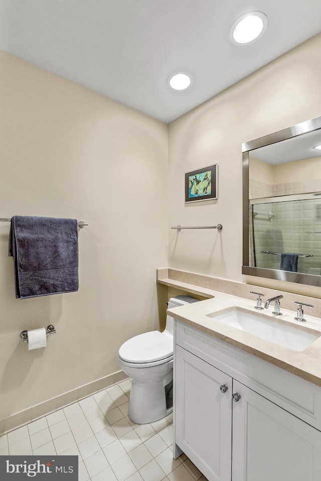 full bathroom featuring tile patterned flooring, toilet, recessed lighting, vanity, and a stall shower