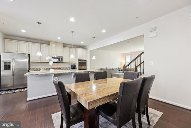 dining space with stairs, baseboards, dark wood finished floors, and recessed lighting