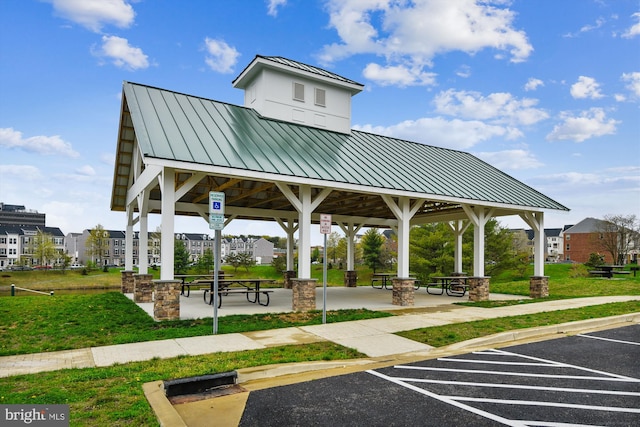 view of community with a lawn and a gazebo