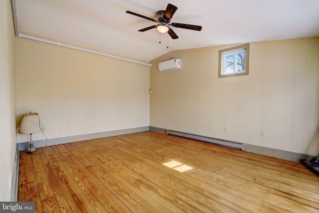 unfurnished room featuring ceiling fan, lofted ceiling, a baseboard heating unit, wood finished floors, and a wall mounted air conditioner