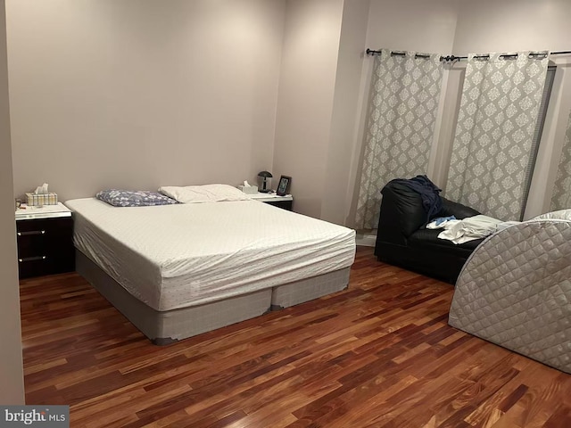 bedroom featuring wood finished floors