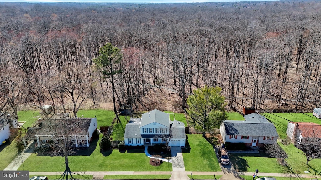 aerial view featuring a view of trees