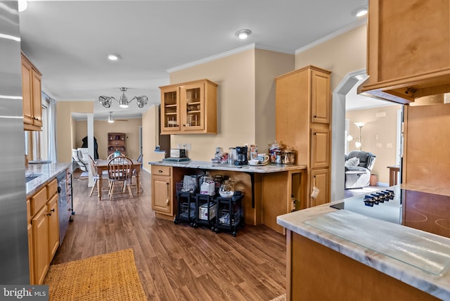 kitchen with dark wood-style flooring, ornamental molding, light stone countertops, dishwasher, and glass insert cabinets