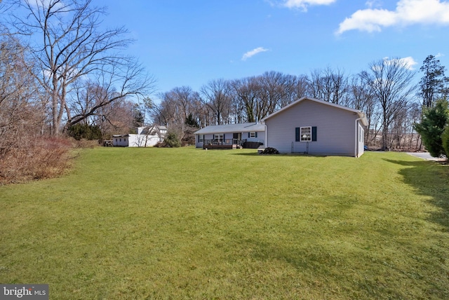 view of yard featuring a deck