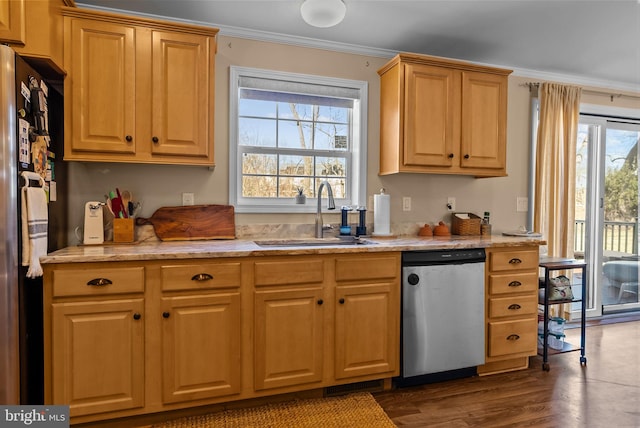 kitchen with light stone counters, stainless steel appliances, dark wood-style flooring, a sink, and crown molding