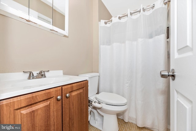 full bath featuring tile patterned flooring, a shower with shower curtain, toilet, and vanity