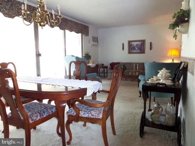 dining space with a chandelier, carpet, and a wall unit AC