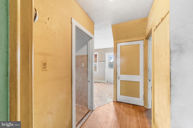 hallway with wood finished floors