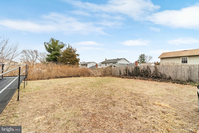 view of yard with fence