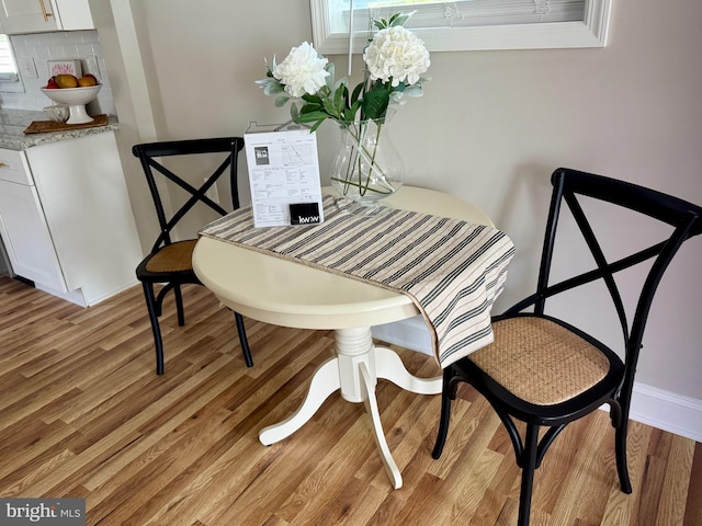 dining room featuring light wood-style flooring