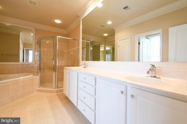 bathroom featuring ornamental molding, tile patterned flooring, a sink, and visible vents