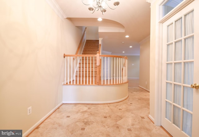 corridor featuring ornamental molding, recessed lighting, baseboards, and stairs