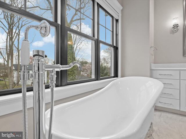 403 Colin Ln NW, Vienna, VA 22180 - full bathroom with marble finish floor and a freestanding tub
