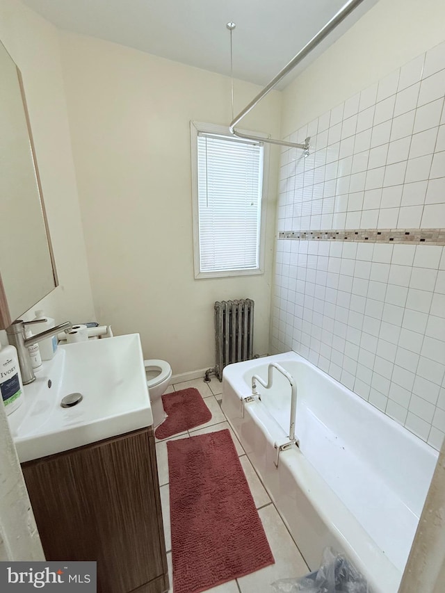 full bath with toilet, radiator heating unit, tile patterned flooring, bathtub / shower combination, and vanity