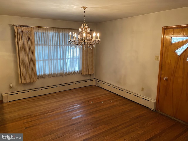 unfurnished dining area featuring baseboard heating, wood finished floors, and a notable chandelier