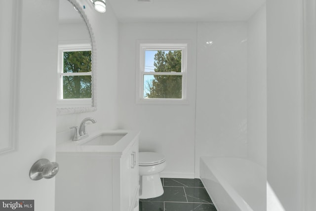 full bathroom with tile patterned floors, plenty of natural light, toilet, and vanity