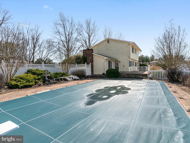 view of sport court with a fenced backyard