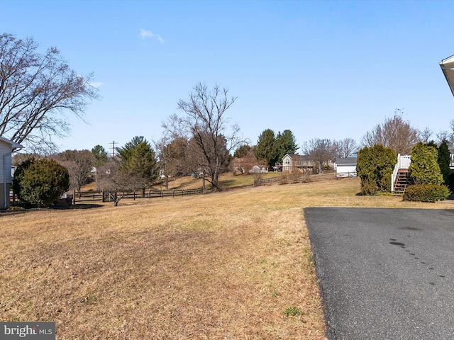 view of yard with fence