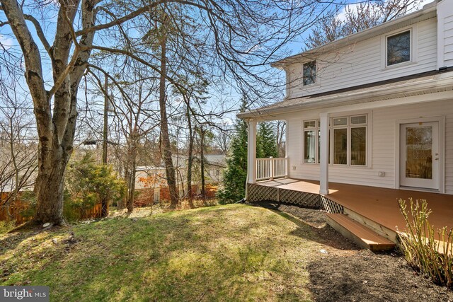 view of yard featuring a wooden deck