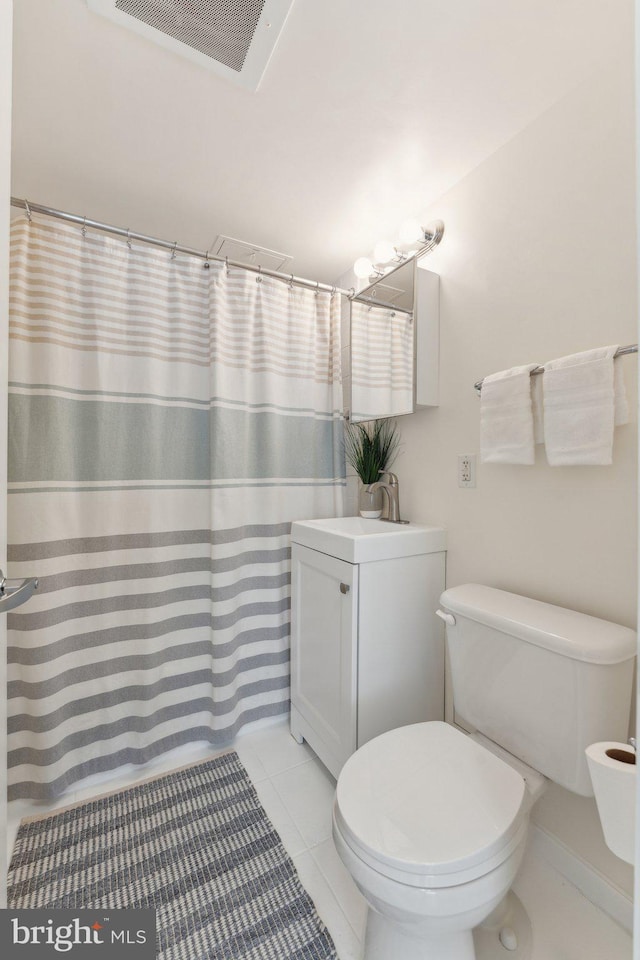 bathroom with tile patterned floors, visible vents, a shower with curtain, toilet, and vanity