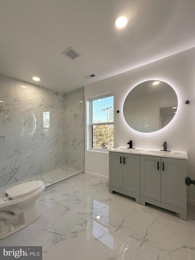 full bathroom with marble finish floor, a marble finish shower, recessed lighting, visible vents, and stone wall