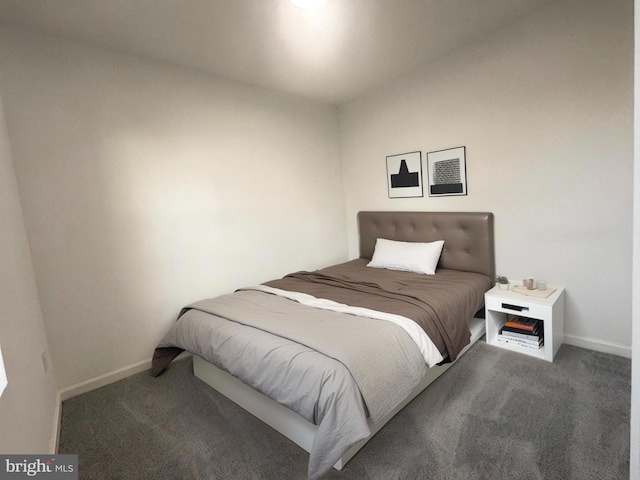 carpeted bedroom with baseboards