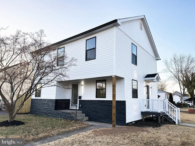 view of front facade with stone siding