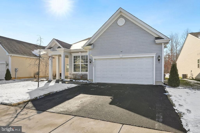 3785 Dorchester Dr, Williamstown, NJ 08094 - ranch-style house featuring aphalt driveway, cooling unit, and a garage