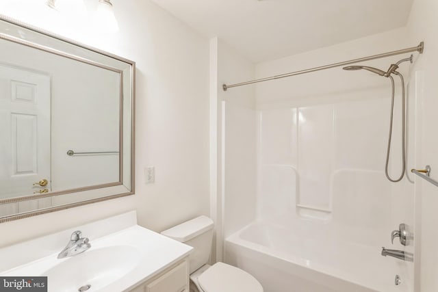 full bathroom with shower / bath combination, toilet, and vanity