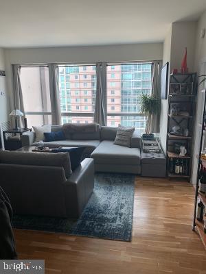 living room with wood finished floors