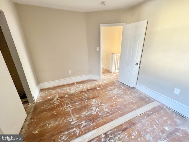 unfurnished bedroom featuring baseboards