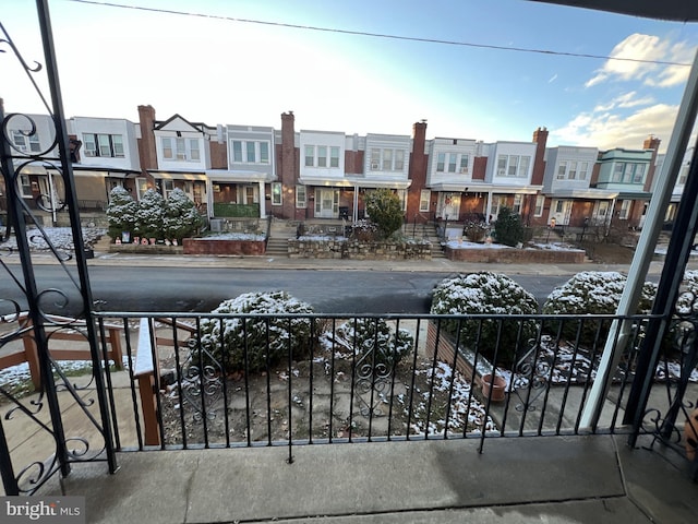 view of gate with a residential view