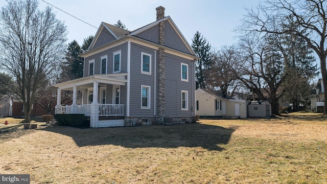 view of property exterior featuring a yard, a porch, a chimney, and central air condition unit